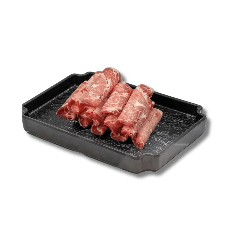 Thinly sliced marbled beef arranged on a black tray.