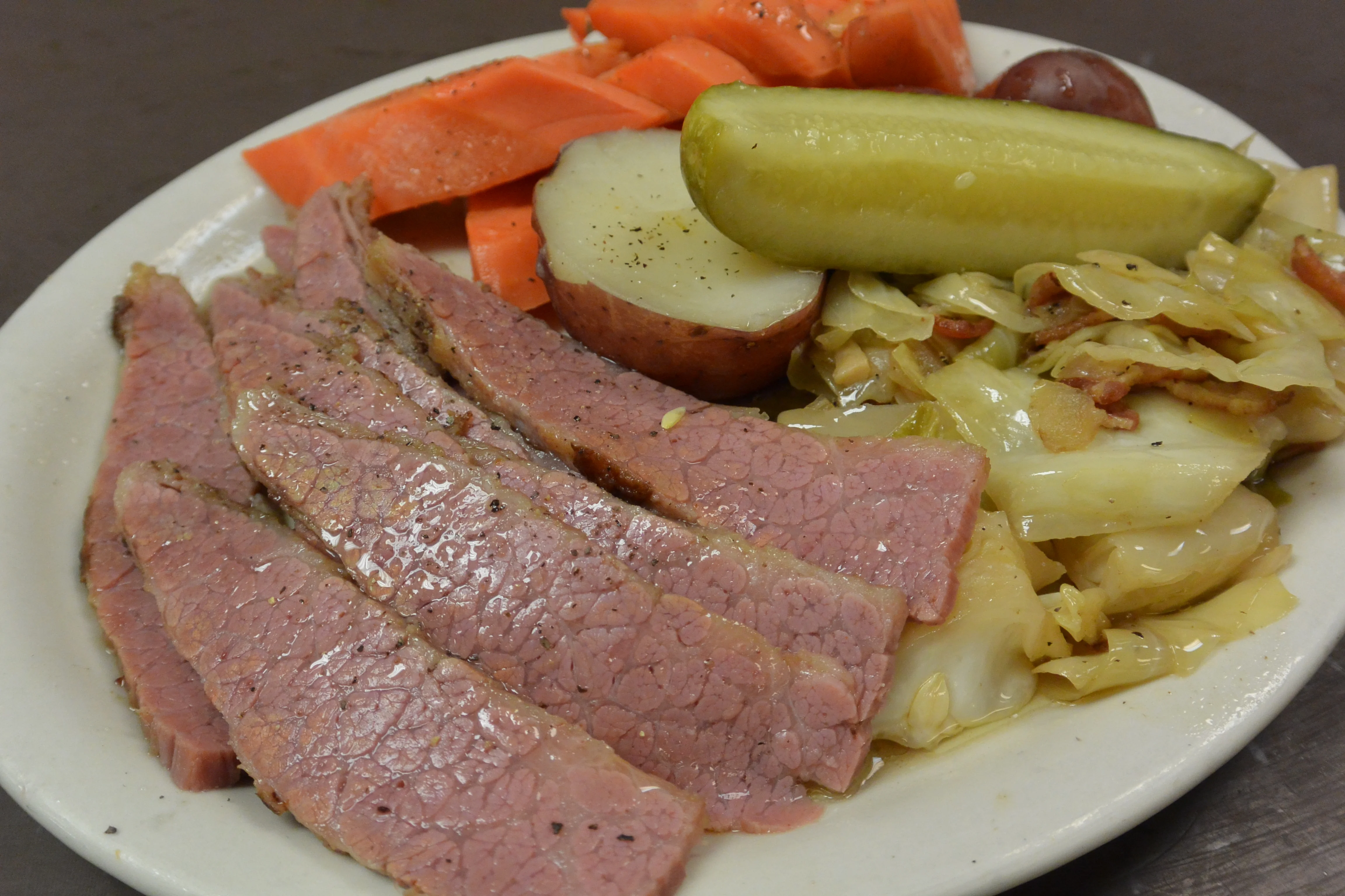 Classic corned beef and cabbage dinner with vegetables