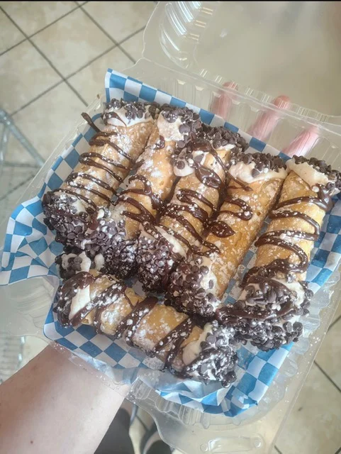 Delicious Italian cannoli with chocolate drizzle