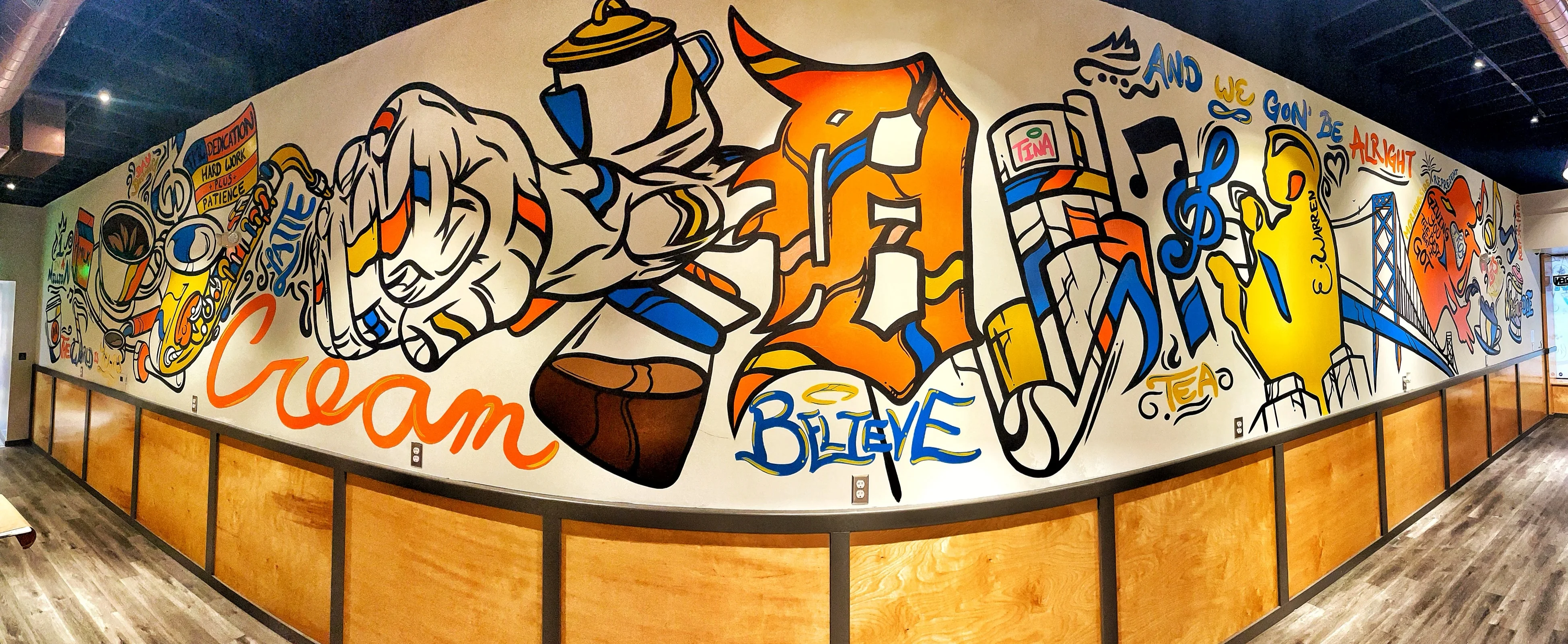 Vibrant mural in a restaurant showcasing creativity and culture