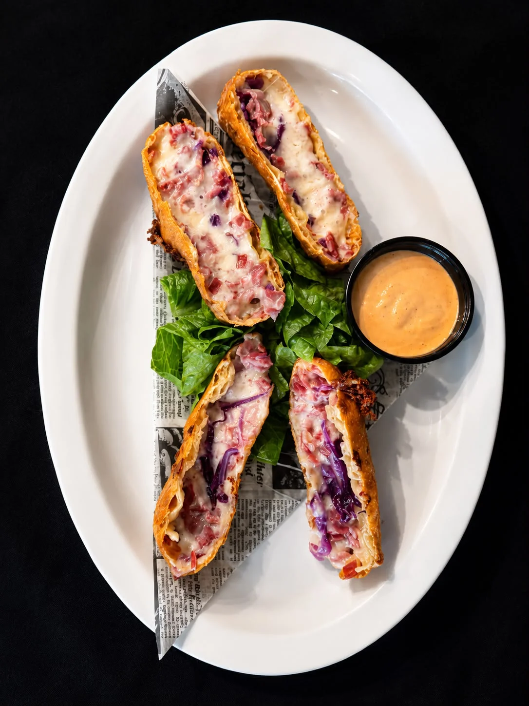 Crispy Cuban pastelitos with dipping sauce