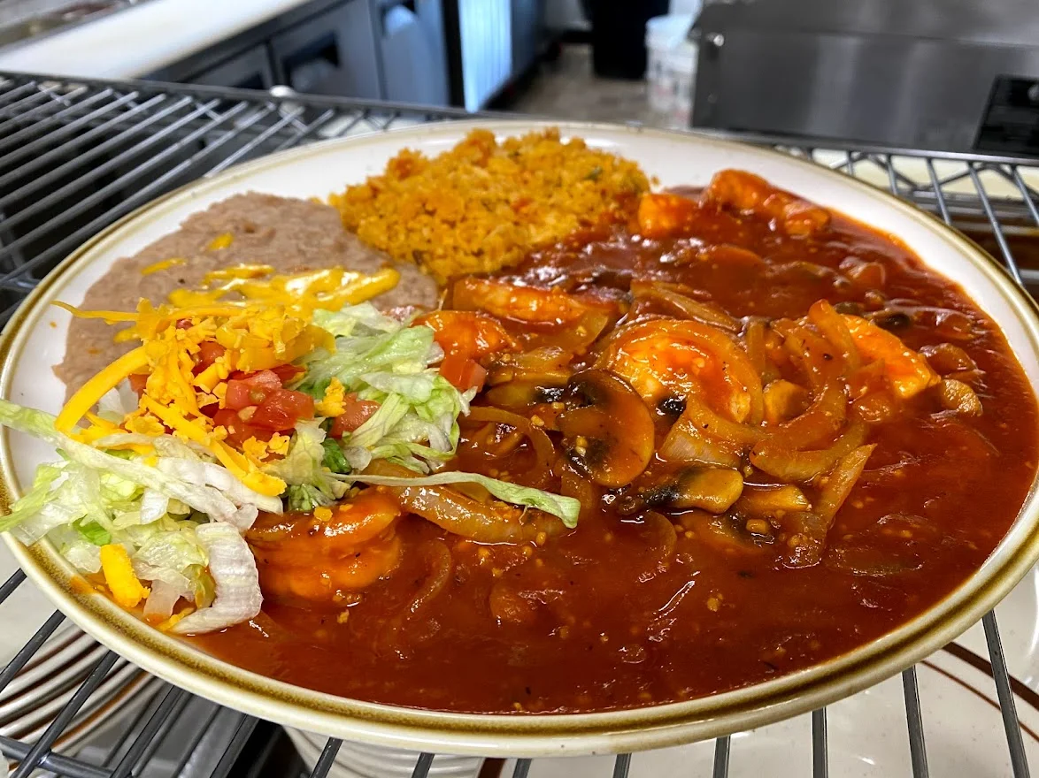 A restaurant chef preparing a dish