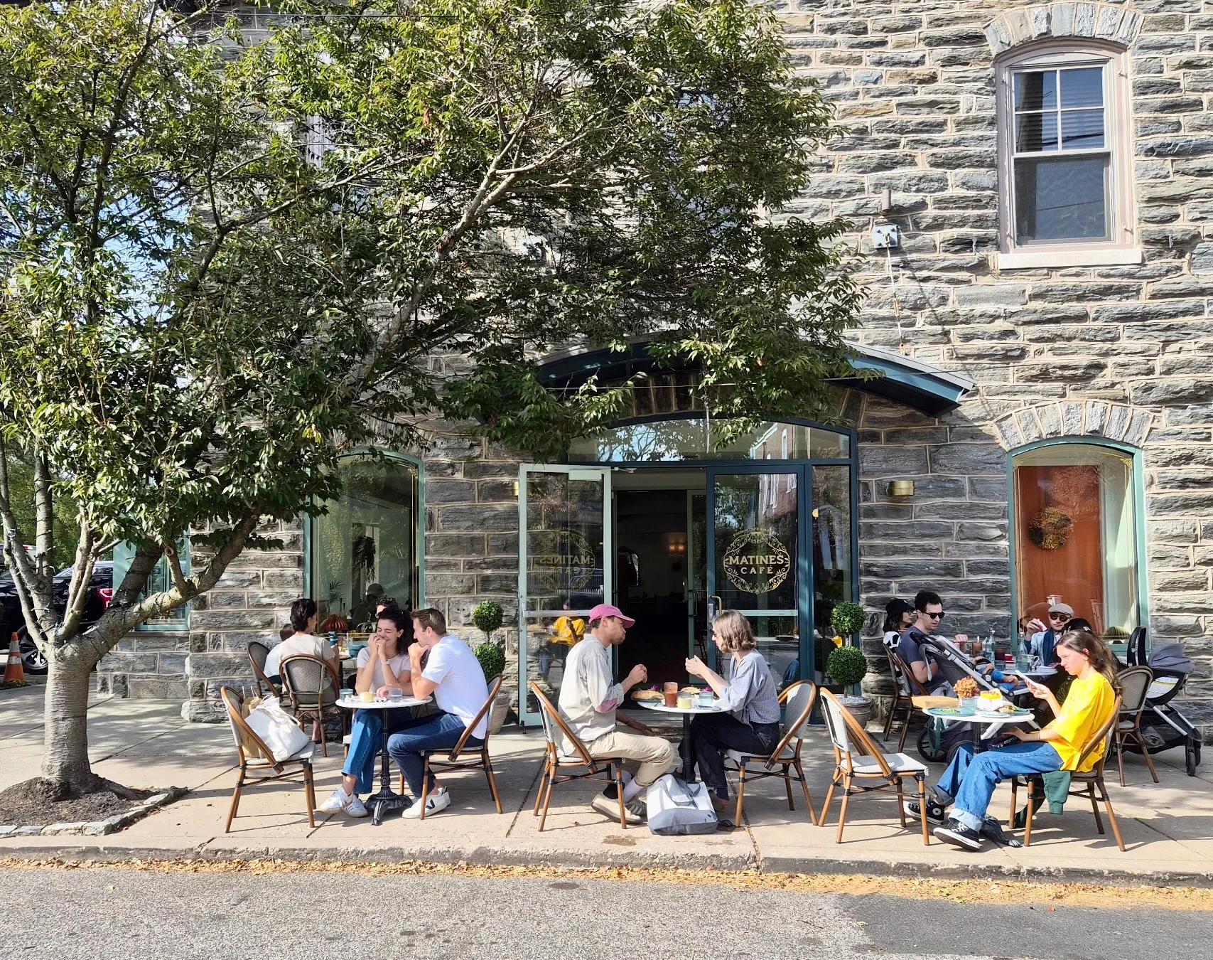 People outside of Matines Café 