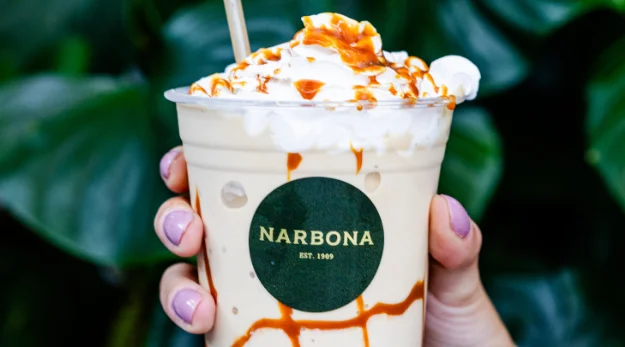 Creamy caramel frappuccino in a clear cup