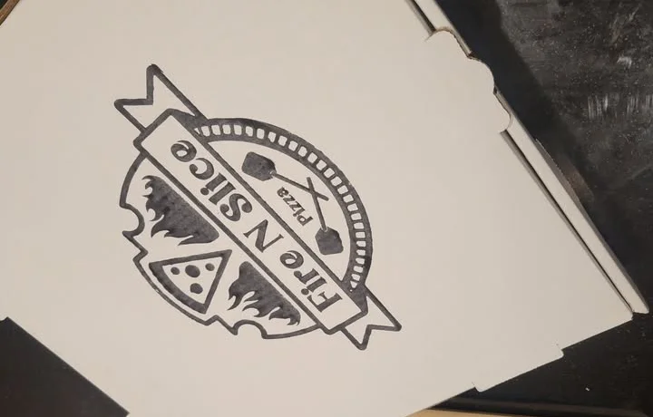 Pepperoni pizza served in a casual dining setting