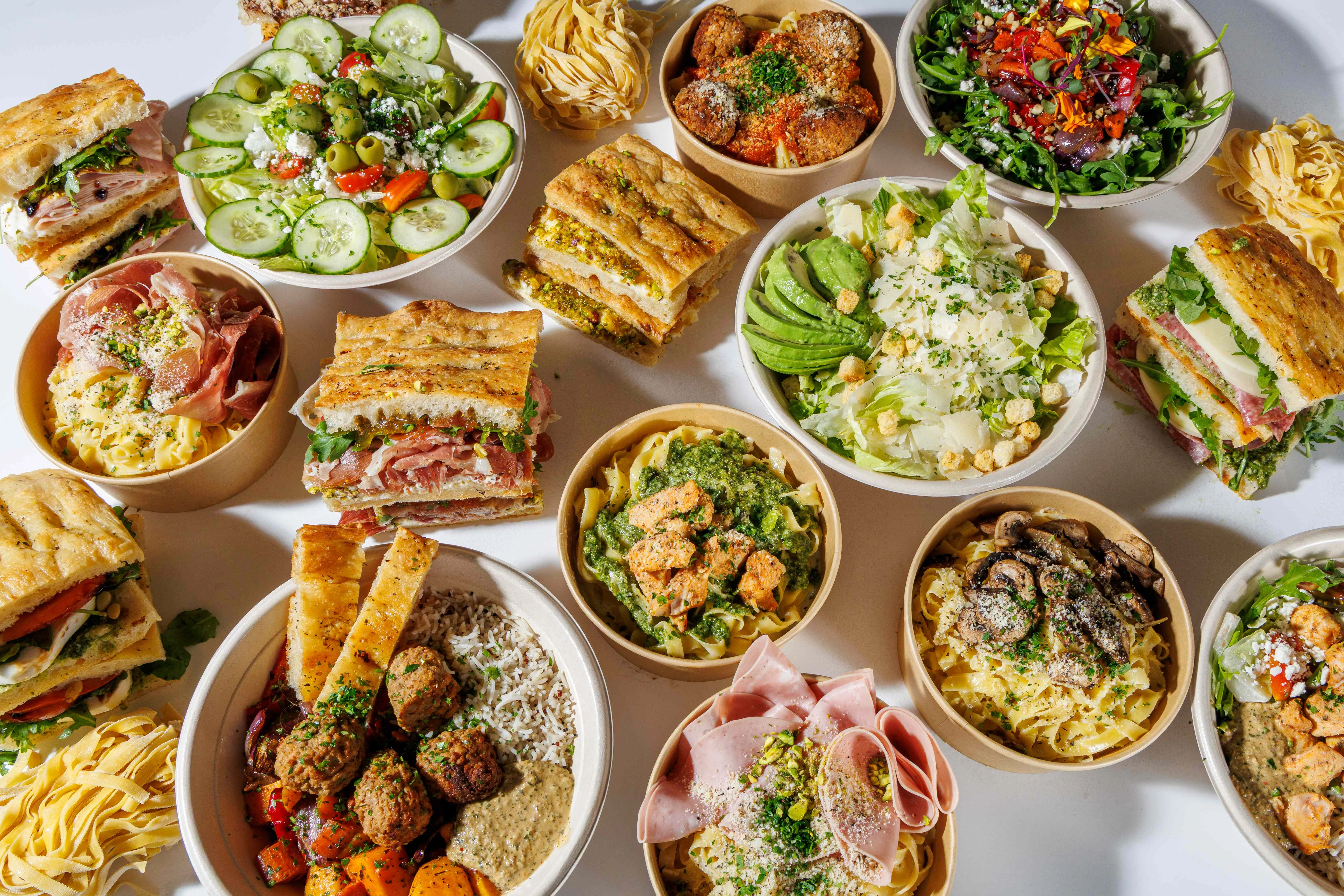 Assorted Mediterranean dishes including pasta and salads