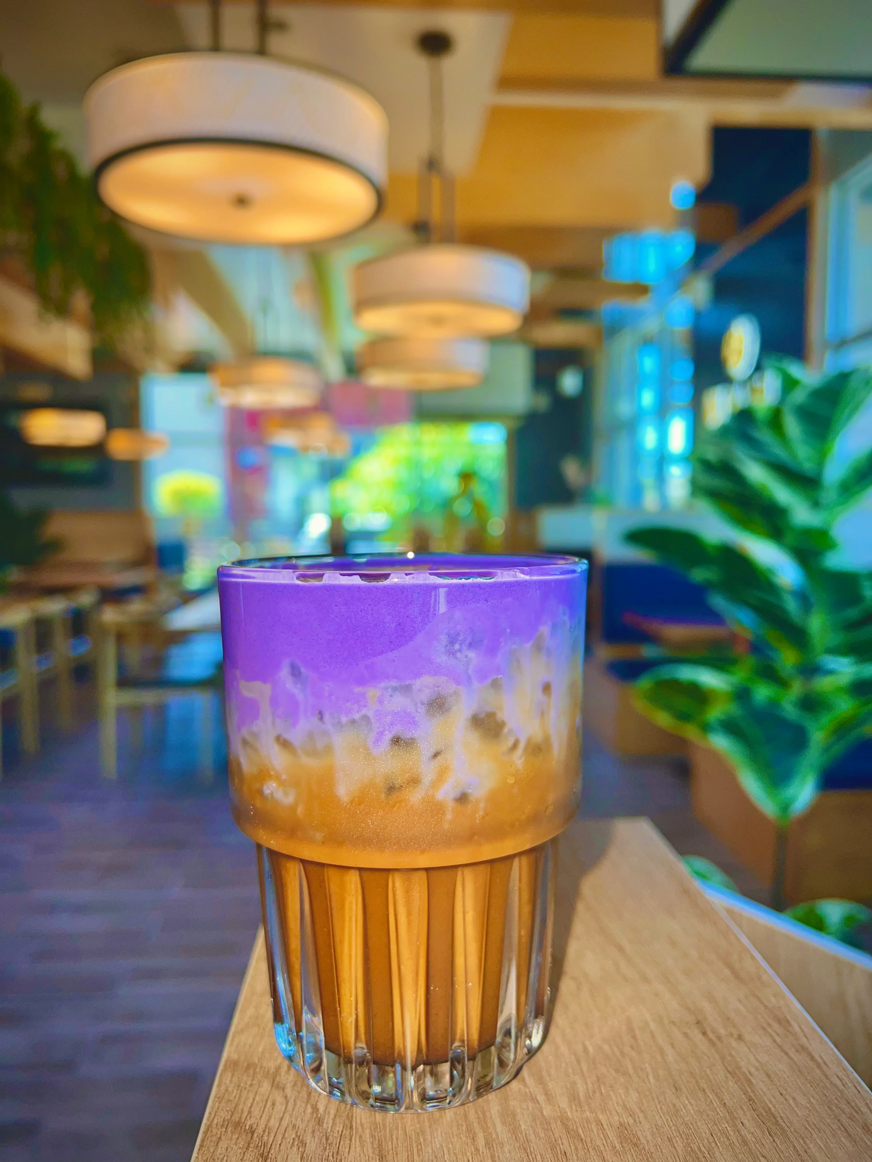 Vietnamese iced coffee fill on top by taro milk cream. The taste you never forget  ;) 
