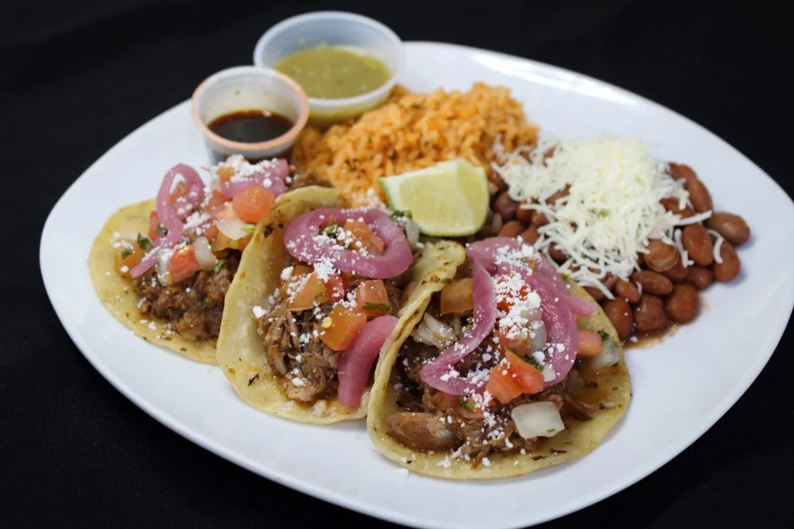 Authentic Mexican tacos with beef and toppings