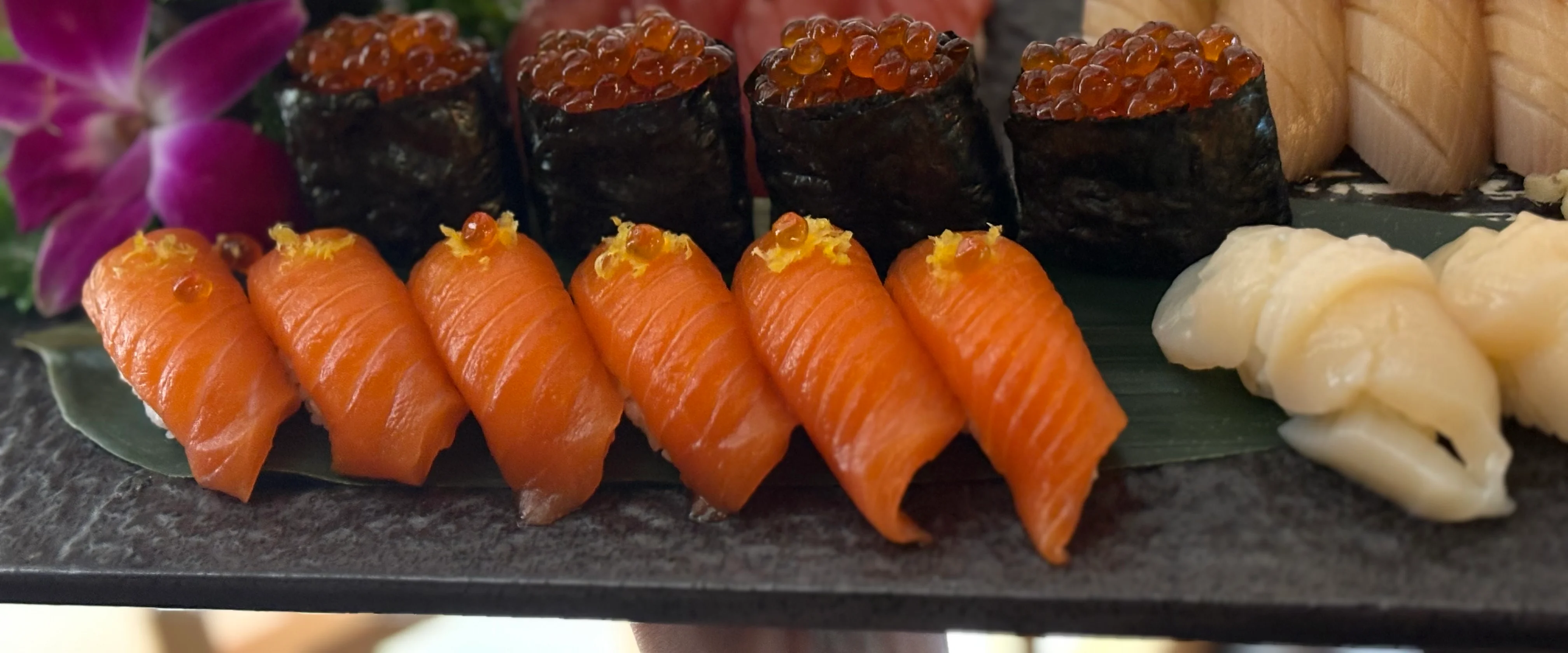 Assorted sushi platter featuring nigiri and maki rolls