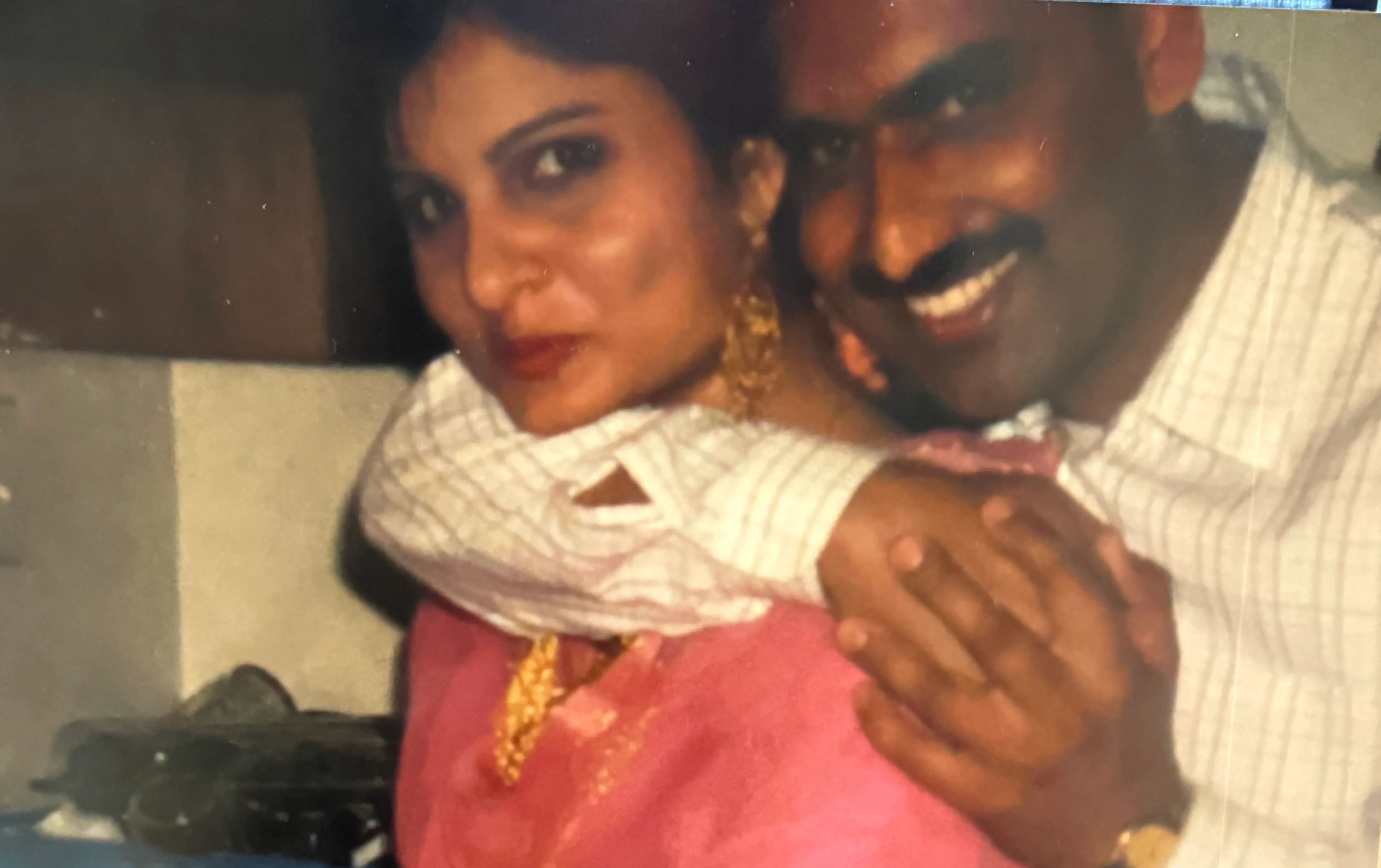 Couple enjoying time together in a kitchen setting