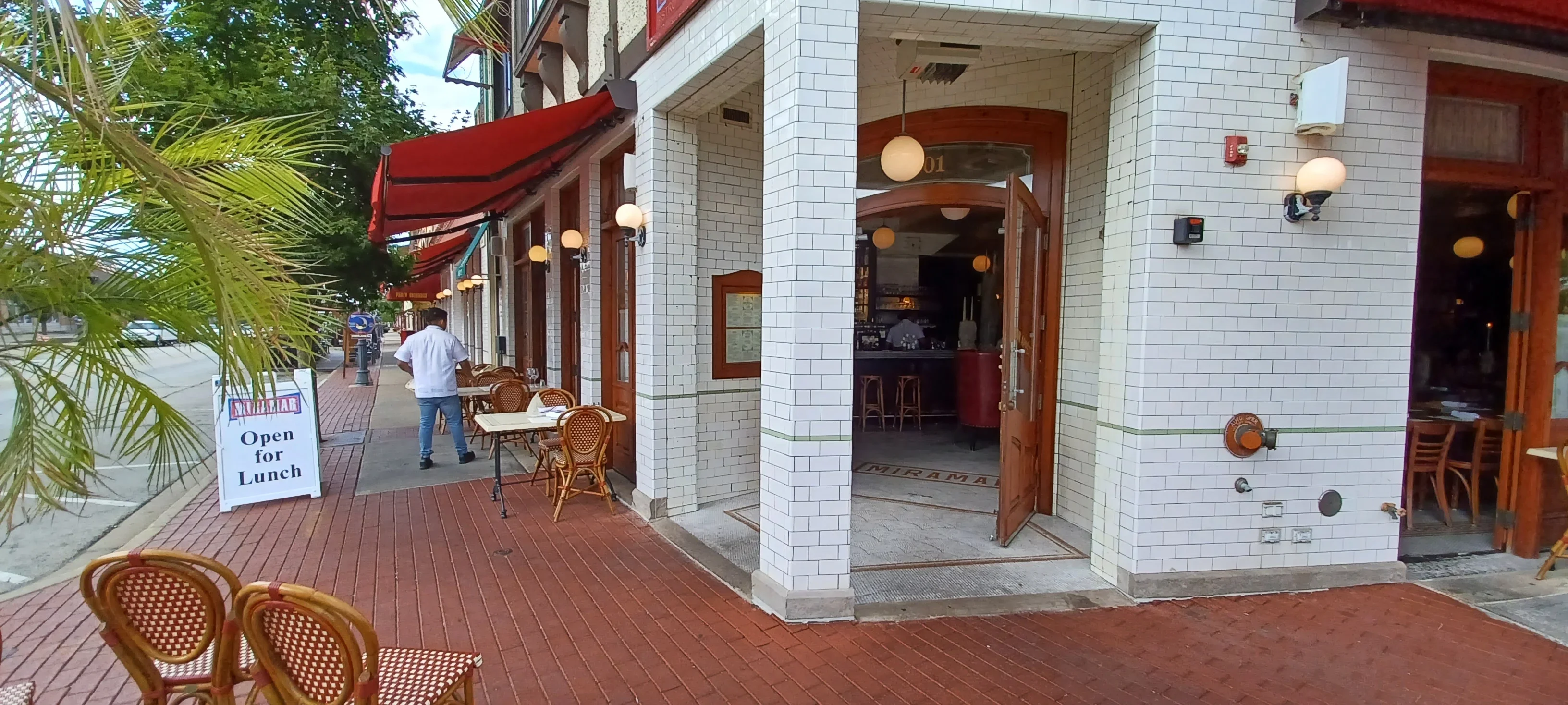Charming restaurant exterior with outdoor seating and inviting entrance