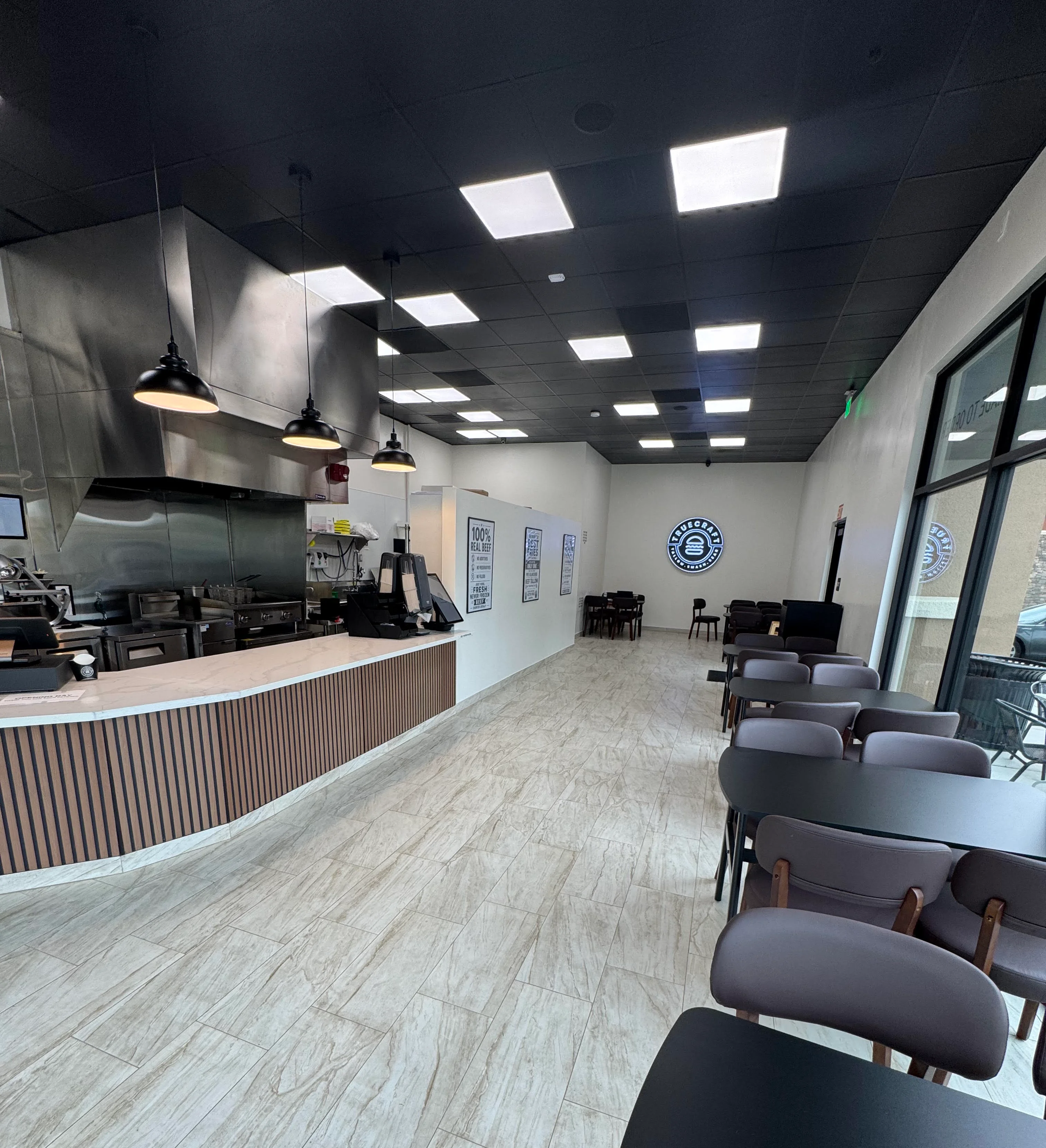 Modern restaurant interior with sleek design and ample seating