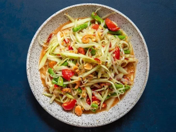 Thai green papaya salad served in a bowl