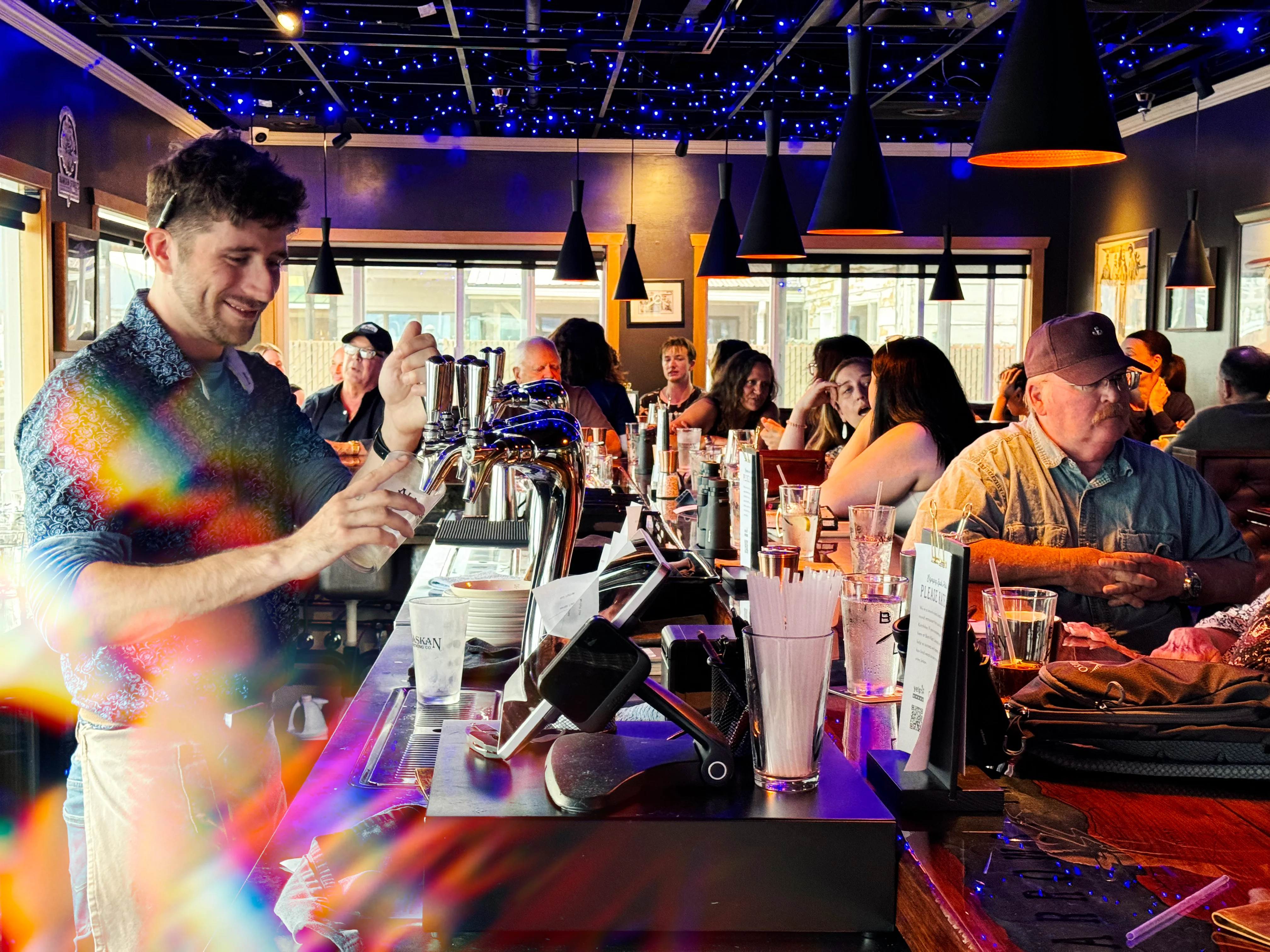 Employee working at our bar.
