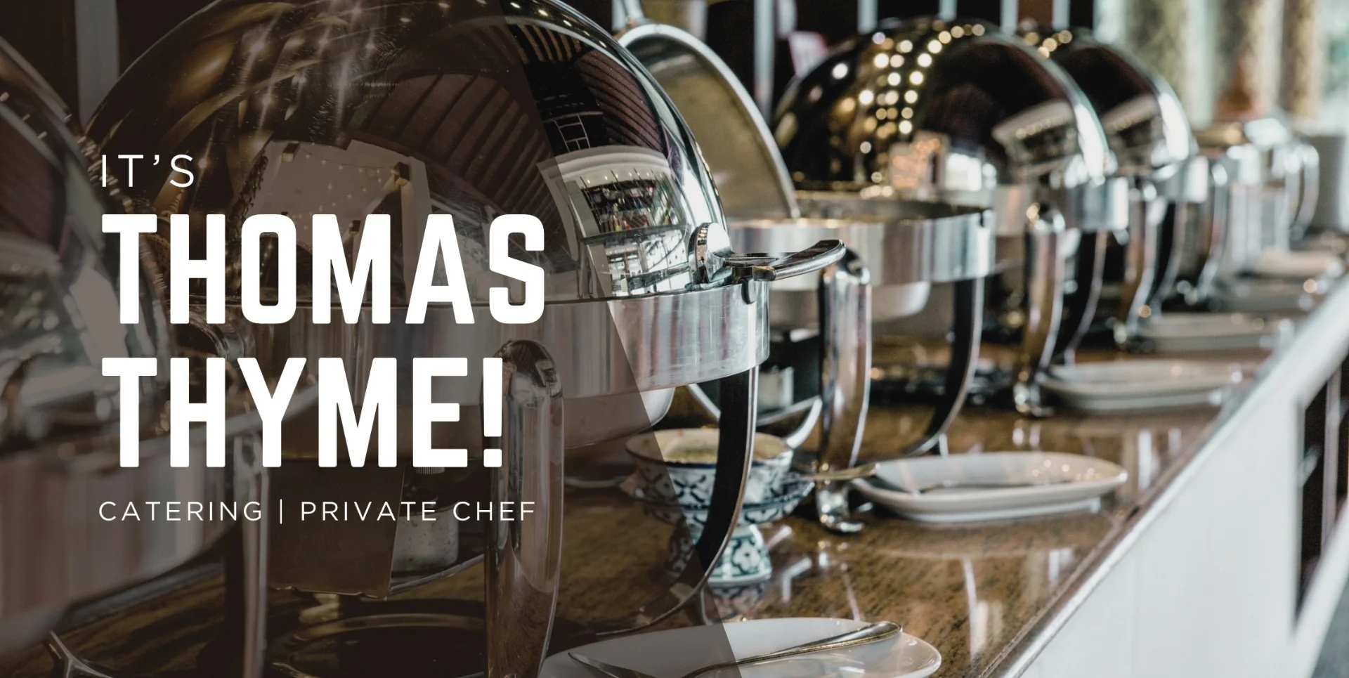 Elegant catering setup with chafing dishes and fine dining decor