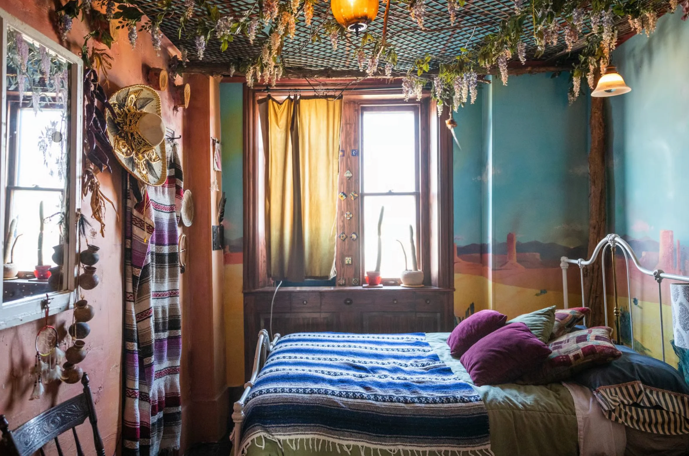 Eclectic bedroom with colorful decor and plants
