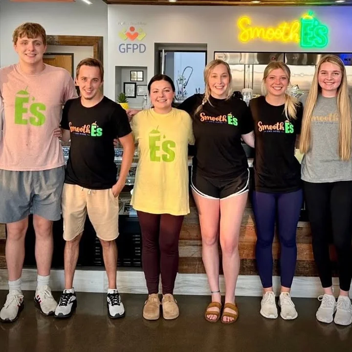 Friendly staff promoting local dining at Smooth E's