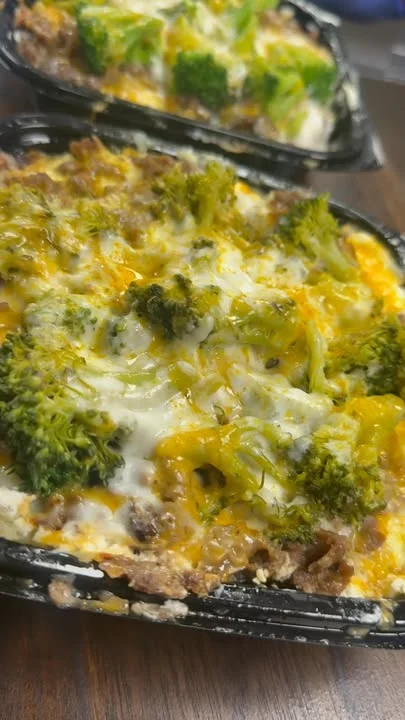 Cheesy broccoli beef casserole in a black dish