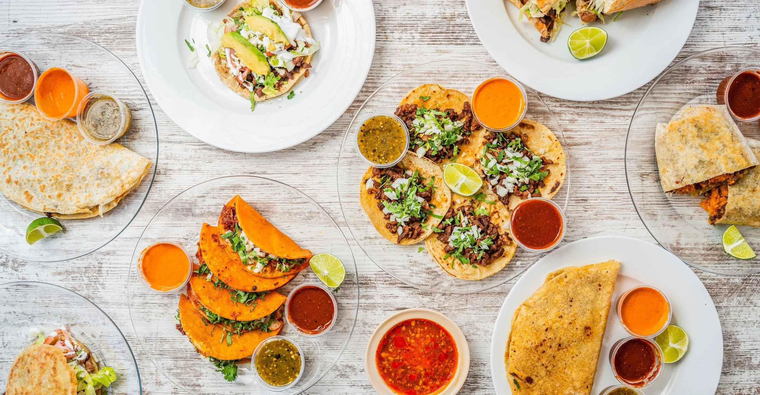 A variety of colorful dishes served on a table.