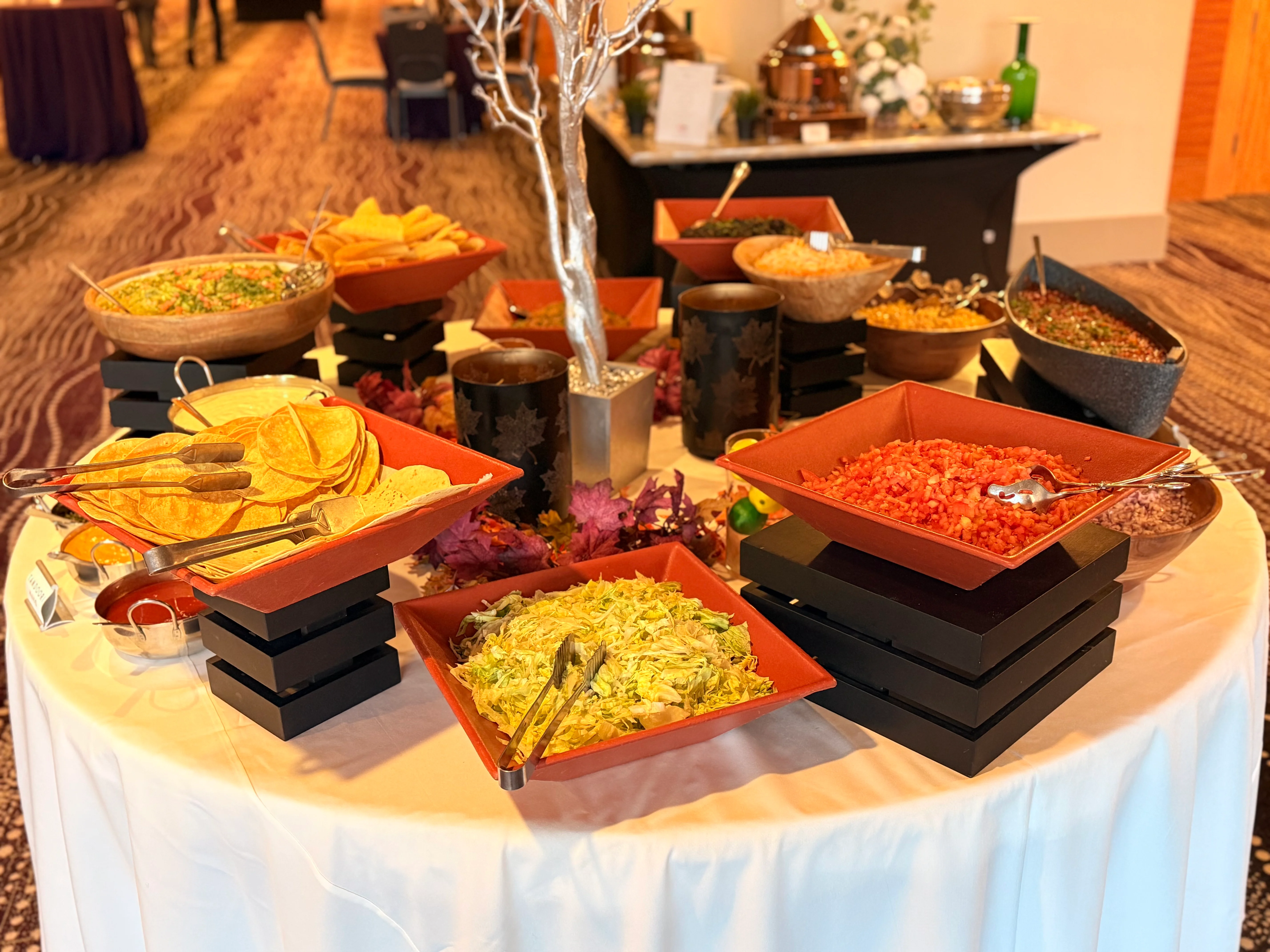Colorful taco bar with fresh toppings and tortillas