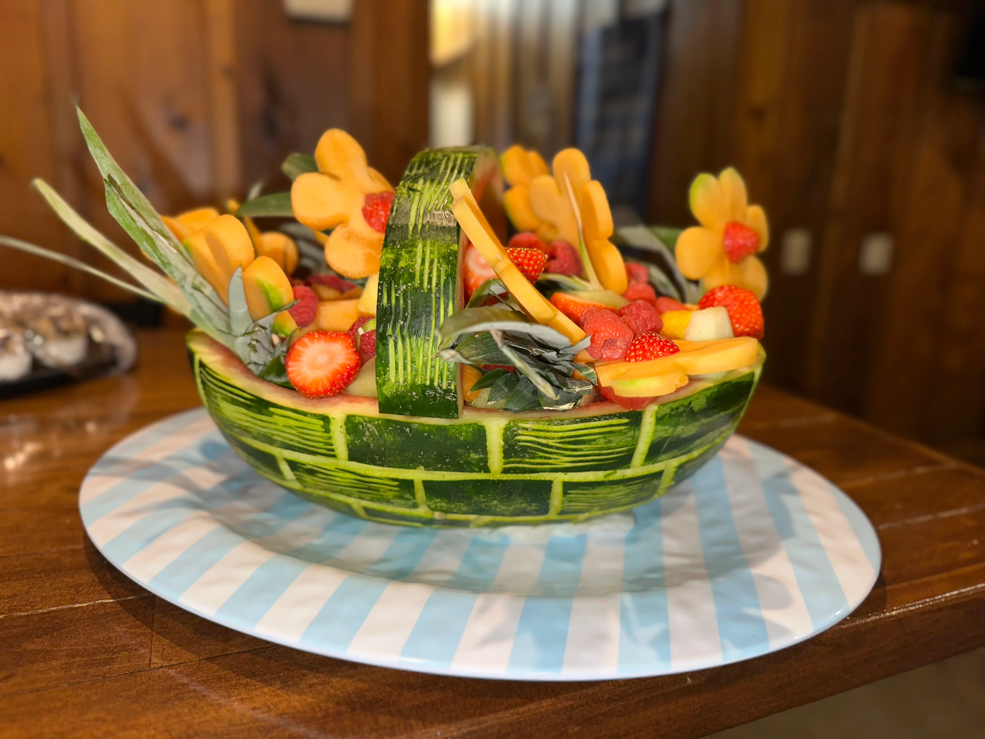Colorful fruit basket carved from watermelon