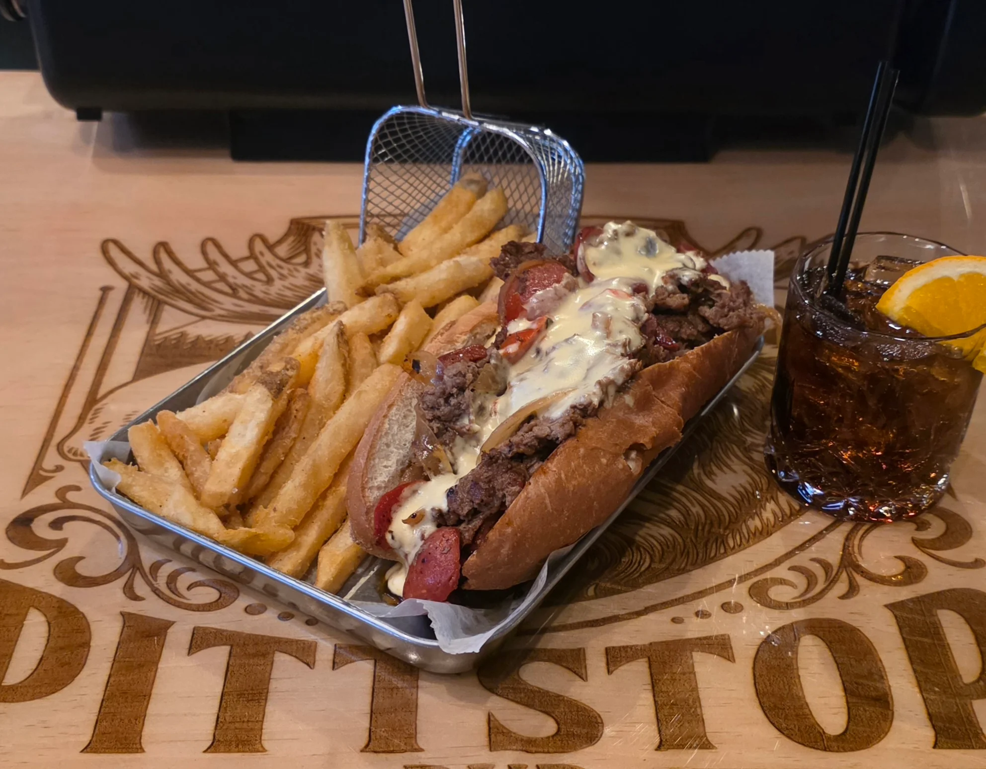 Delicious gourmet burger with fresh toppings on a wooden table
