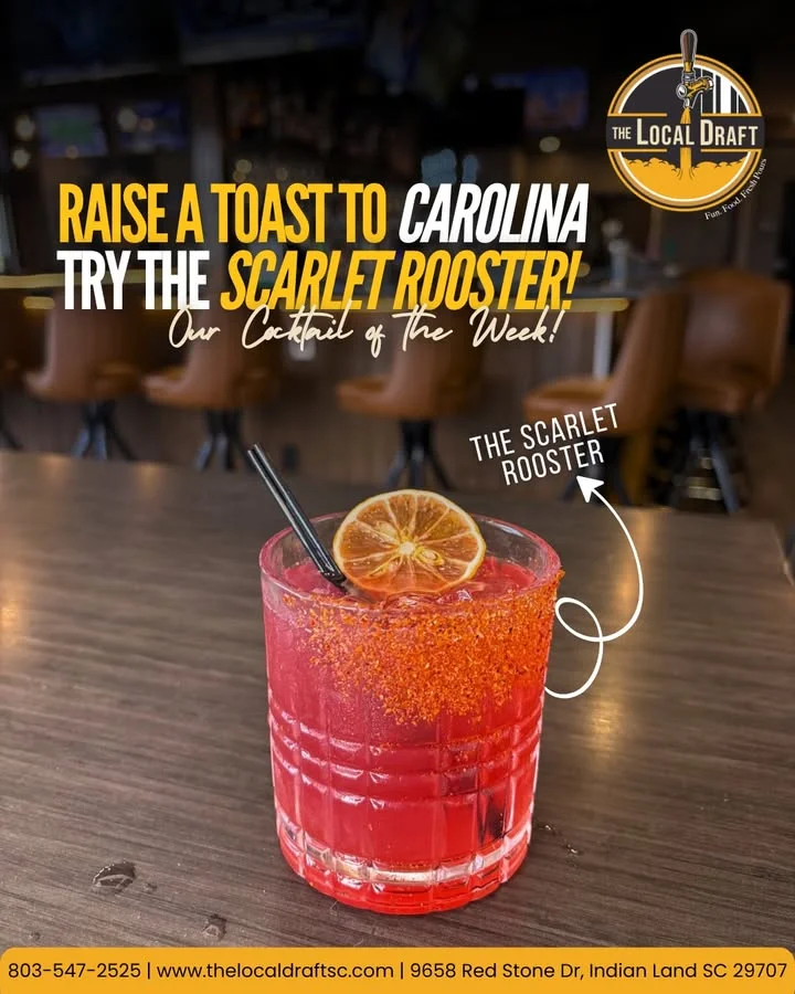 Vibrant cocktail named The Scarlet Rooster at a bar