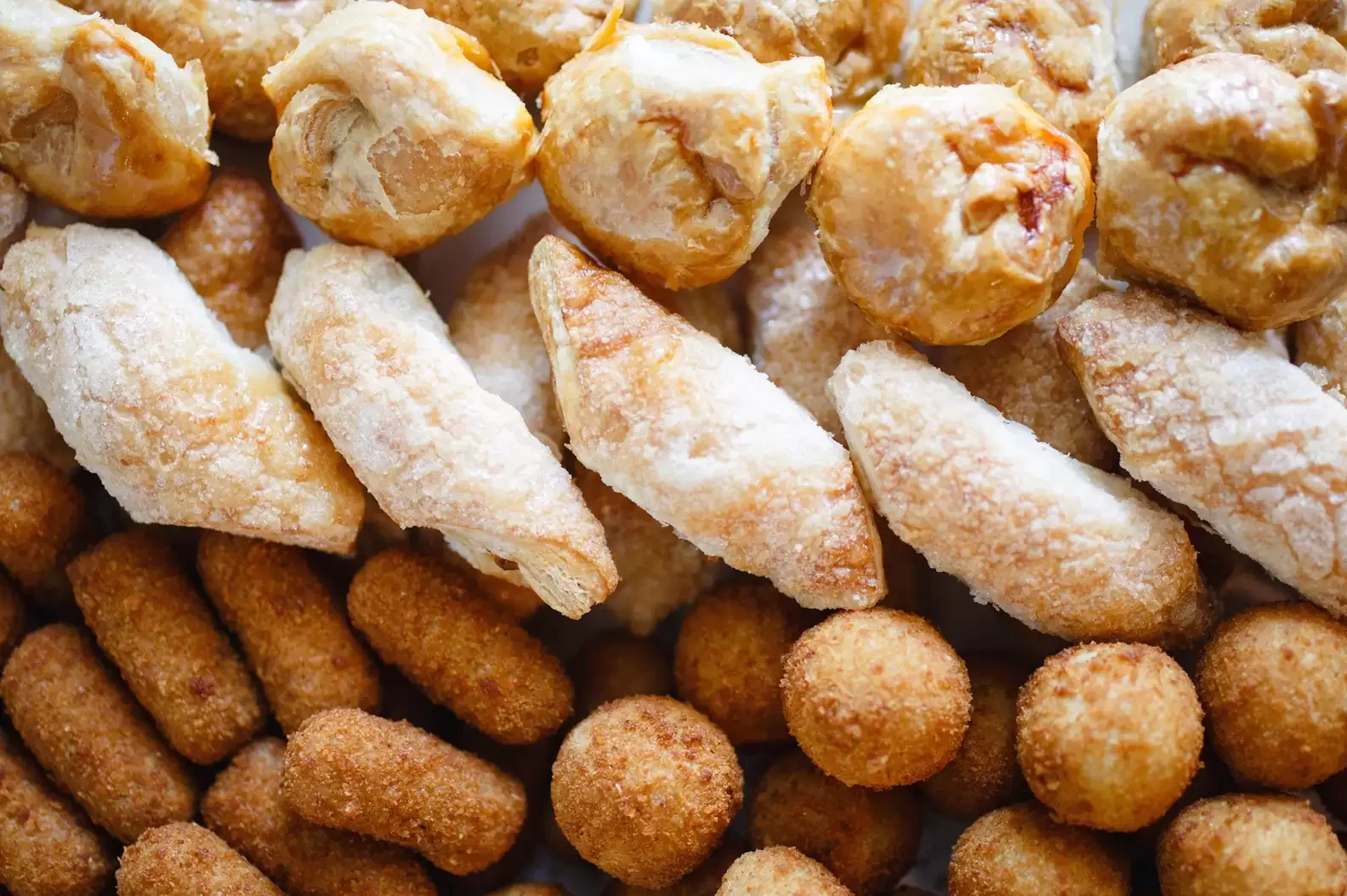 Assorted Latin American empanadas and croquettes