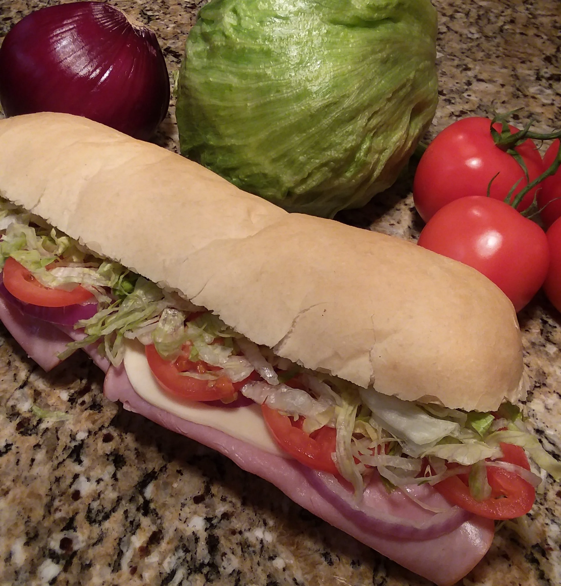 Italian sub sandwich with fresh vegetables