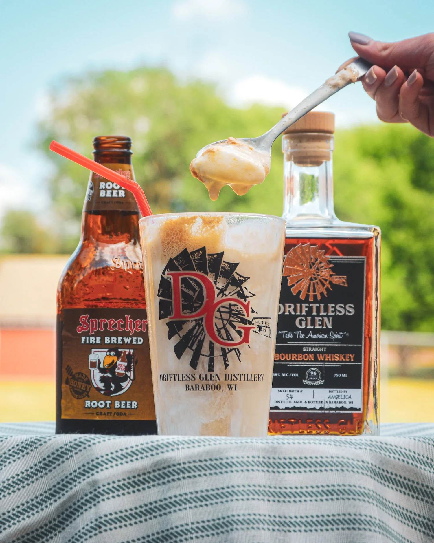 Bourbon root beer float outside on a sunny day