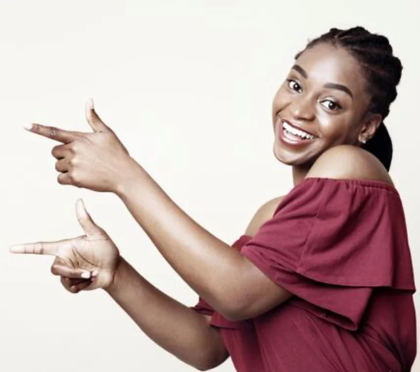 African Girl pointing at Tolex African Grill Rewards Signup