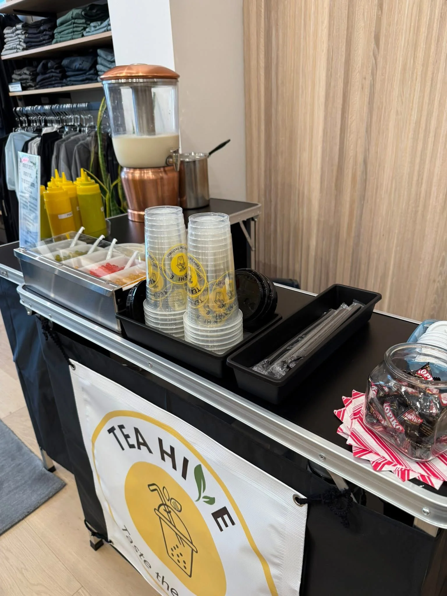 Beverage station with tea and cups at a modern cafe