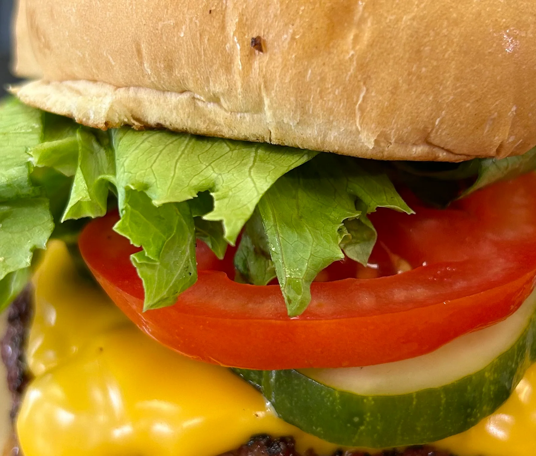Classic American cheeseburger with fresh toppings
