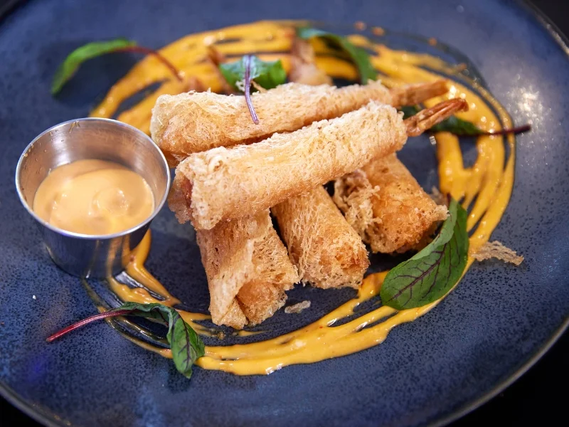 Crispy shrimp spring rolls with dipping sauce