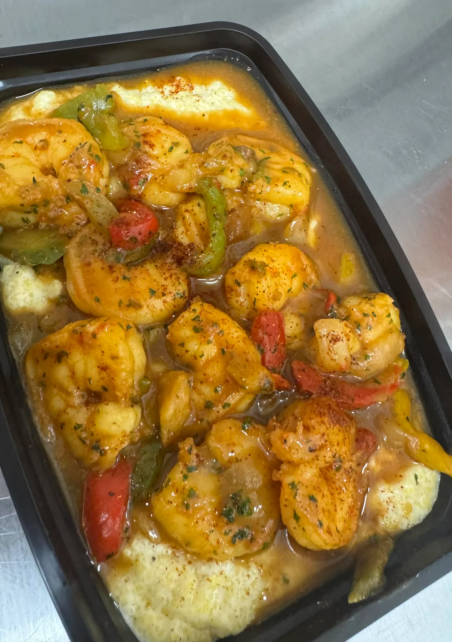 Shrimp and grits in a savory sauce