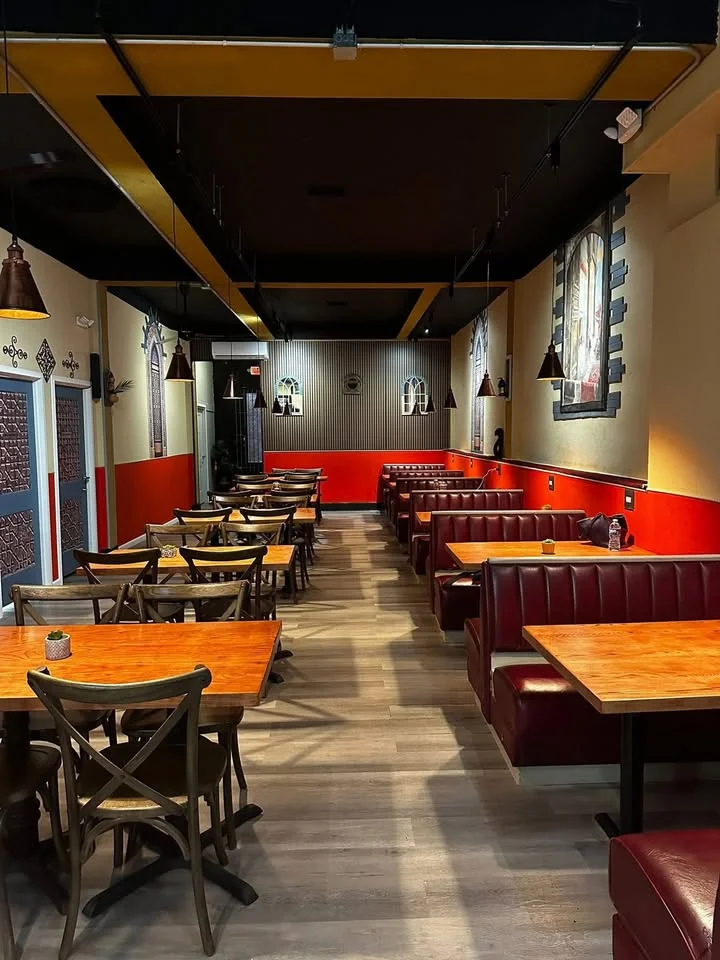 Cozy restaurant interior with red and wooden decor