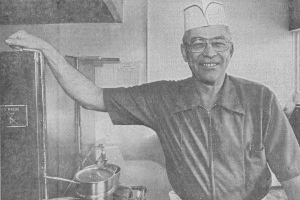 A restaurant chef preparing a dish
