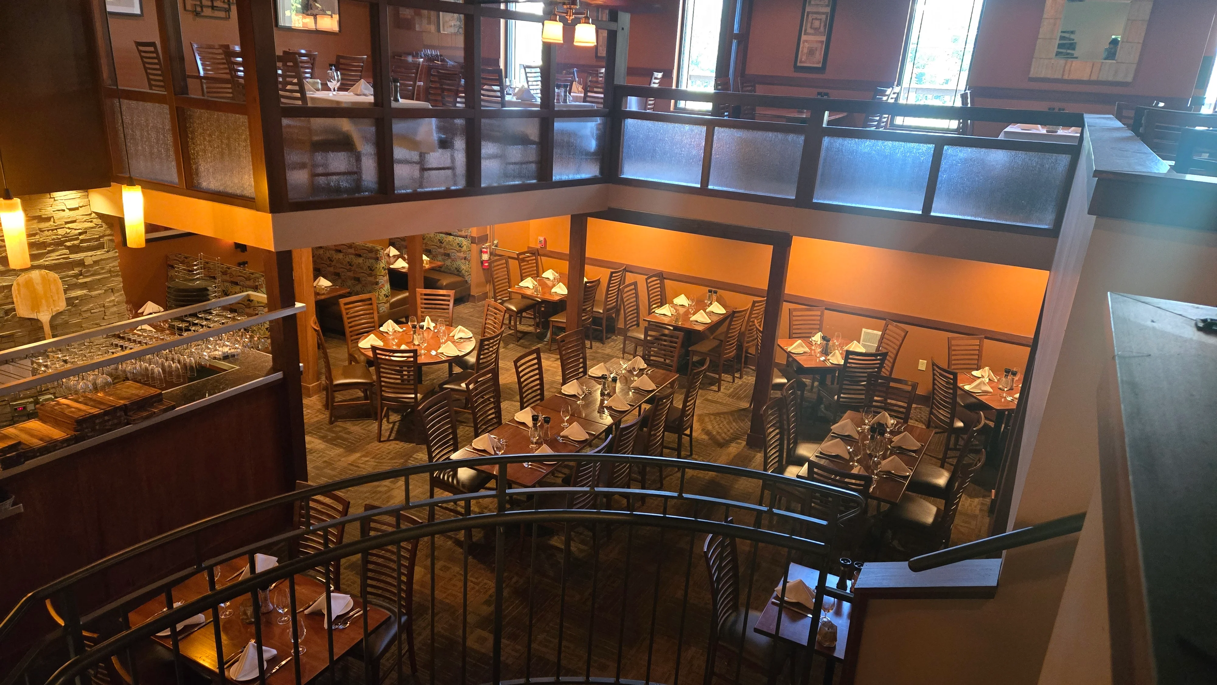Cozy restaurant interior with warm lighting and wooden furniture