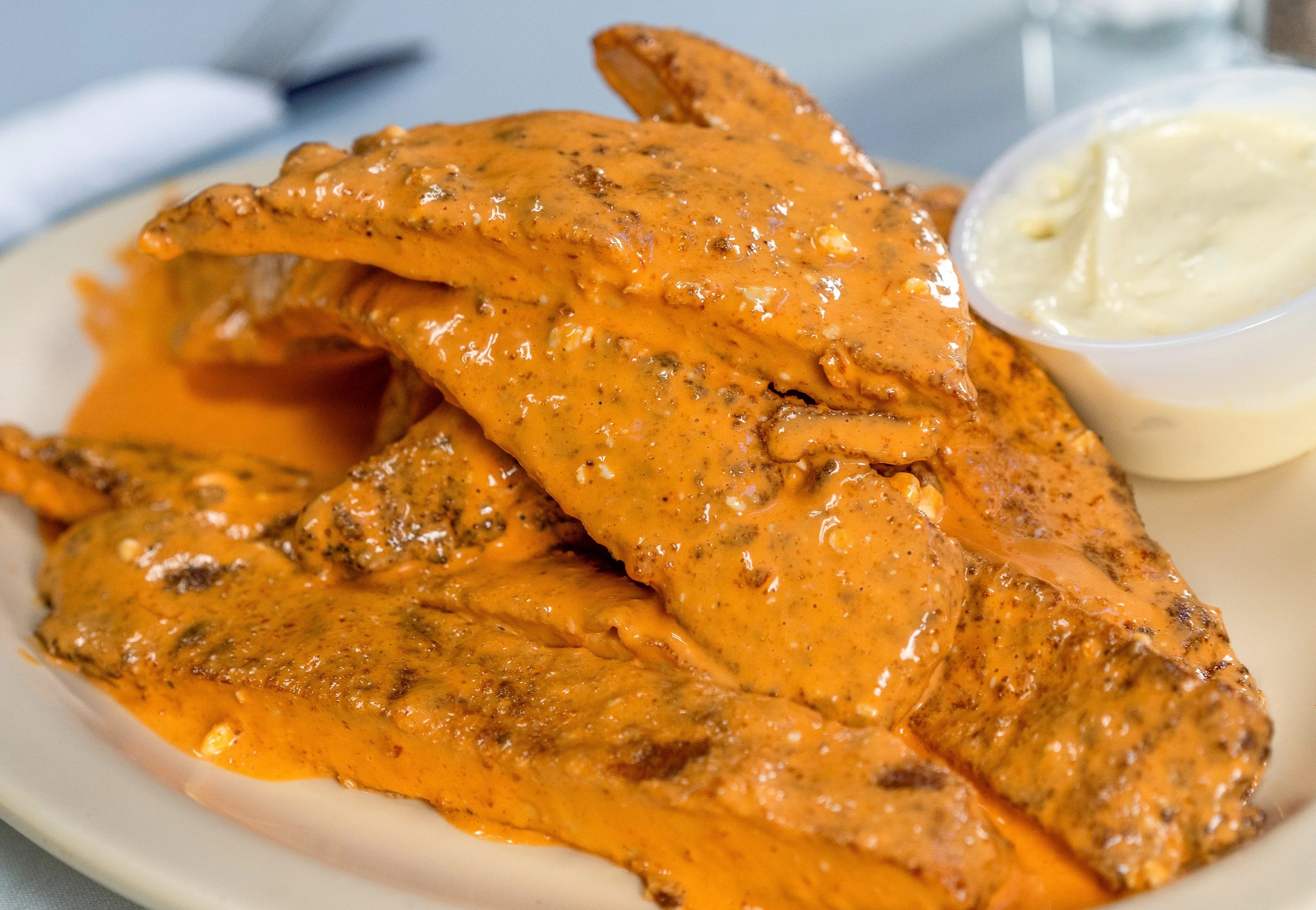 Breaded chicken strips tossed in buffalo sauce, served with dipping sauce.