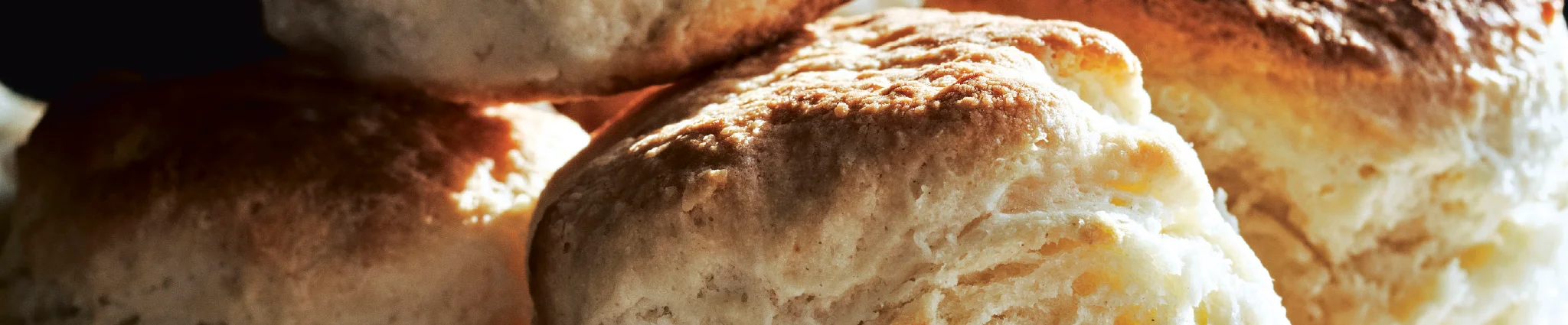 Freshly baked Southern biscuits stacked high