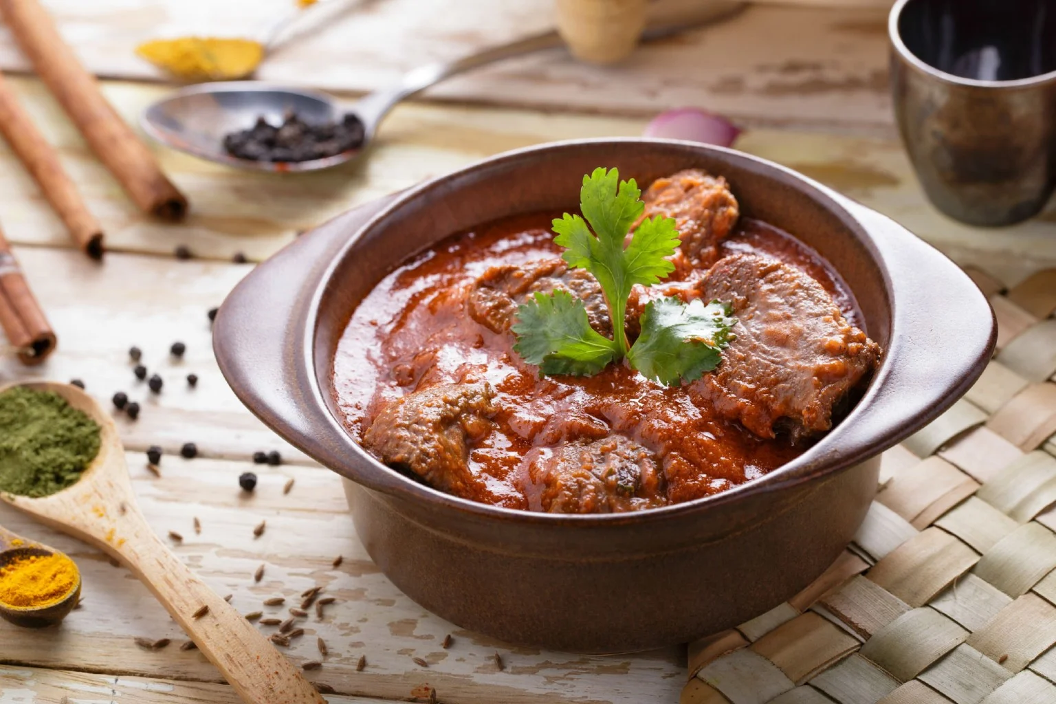 Delicious lamb dish served with vibrant garnishes and herbs.