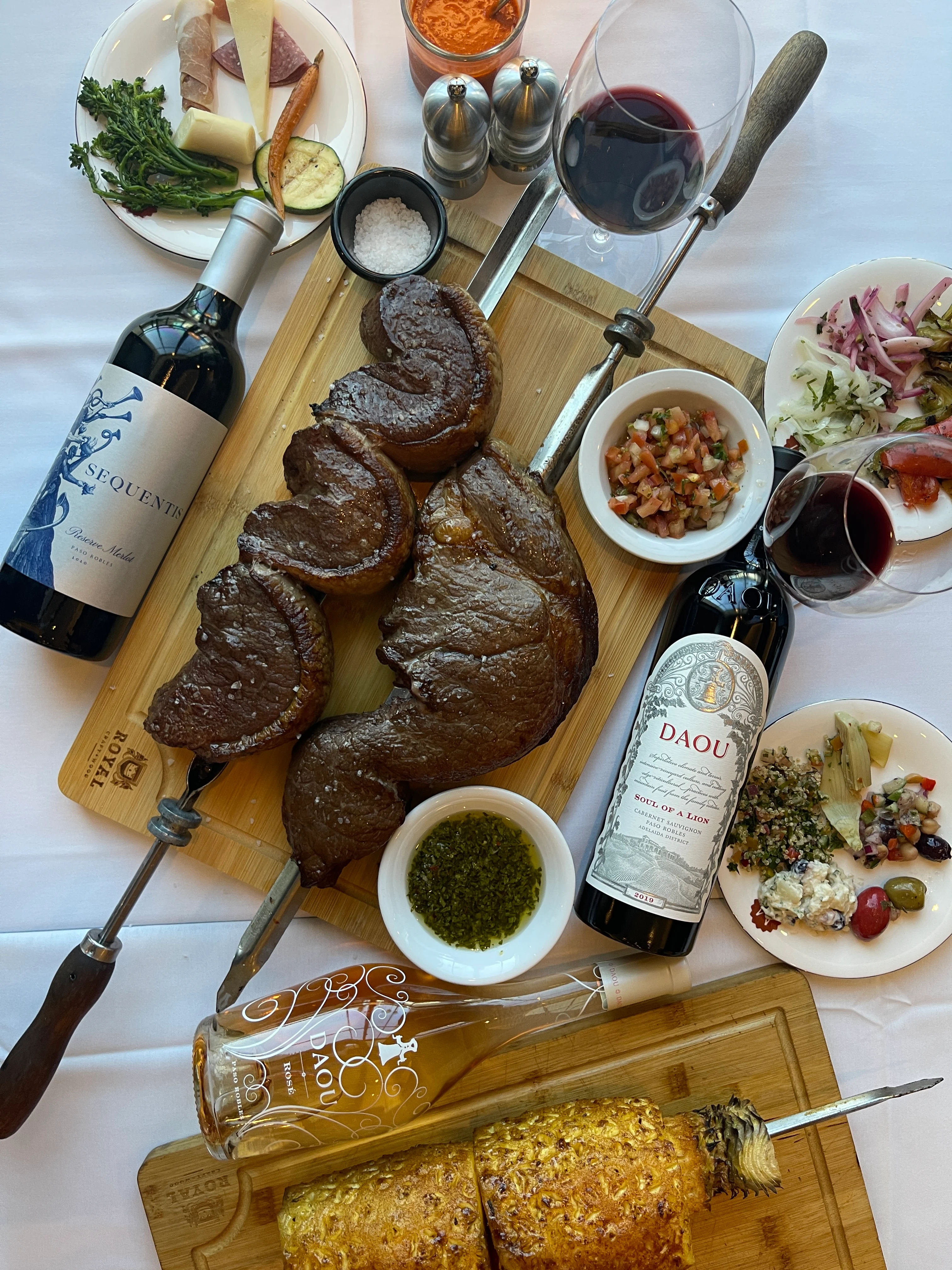 Argentinian asado with grilled meats and red wine