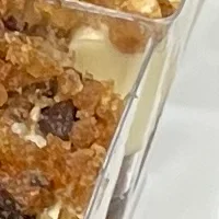 Holiday dessert spread with cookies, brownies, and berry cheesecake cups