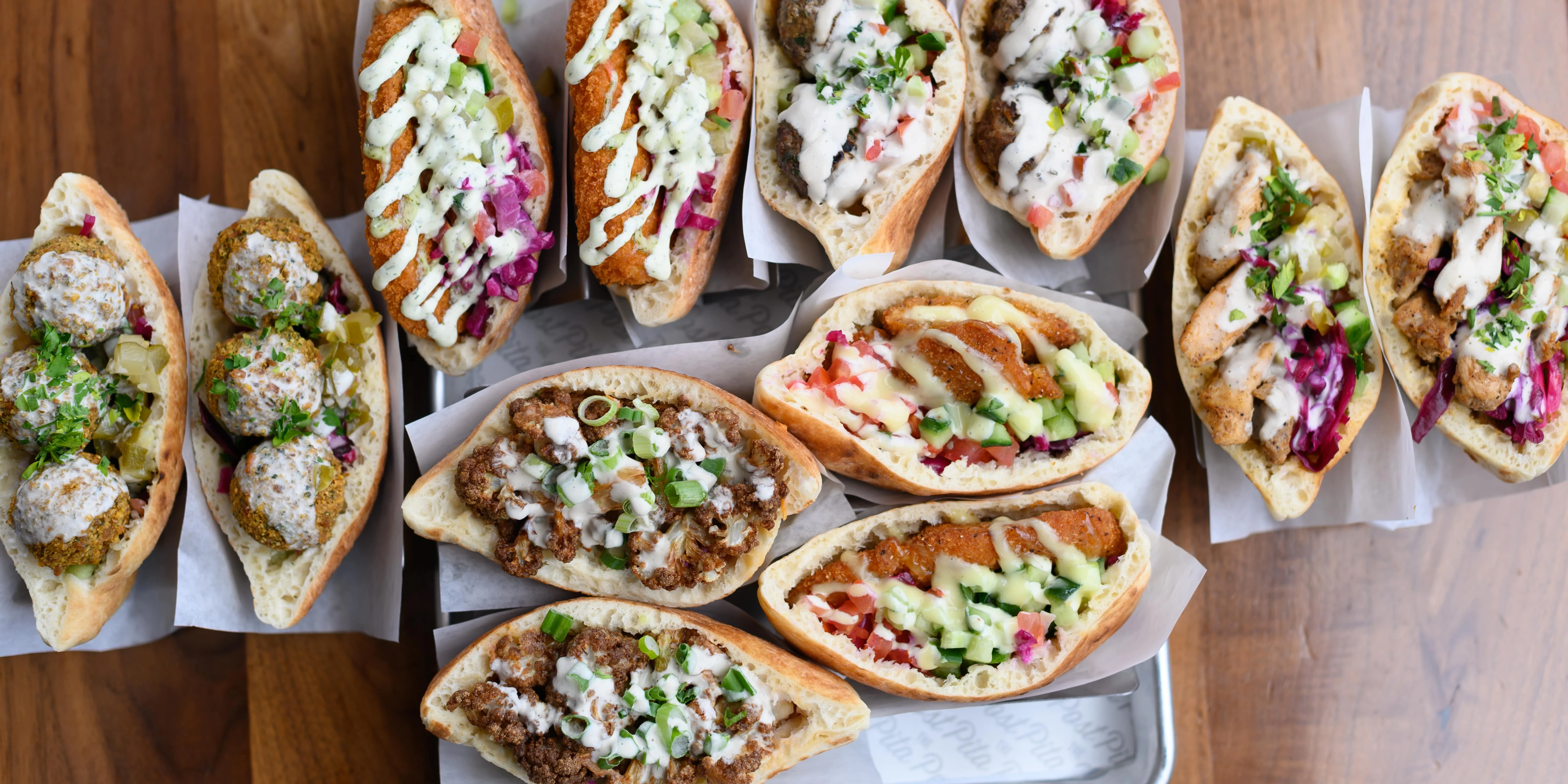 An assortment of stuffed Pita bread prepared by the Pita Post.