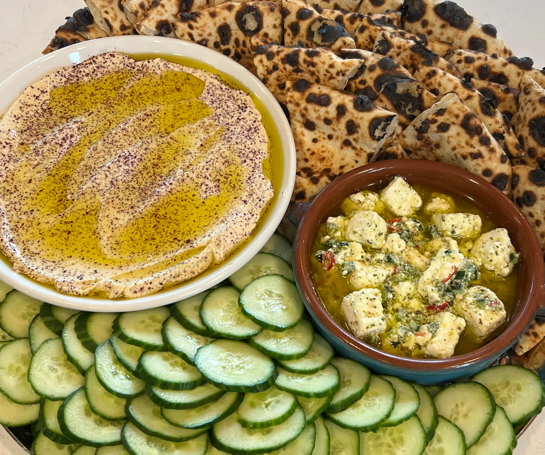 Mediterranean mezze platter with hummus and flatbread