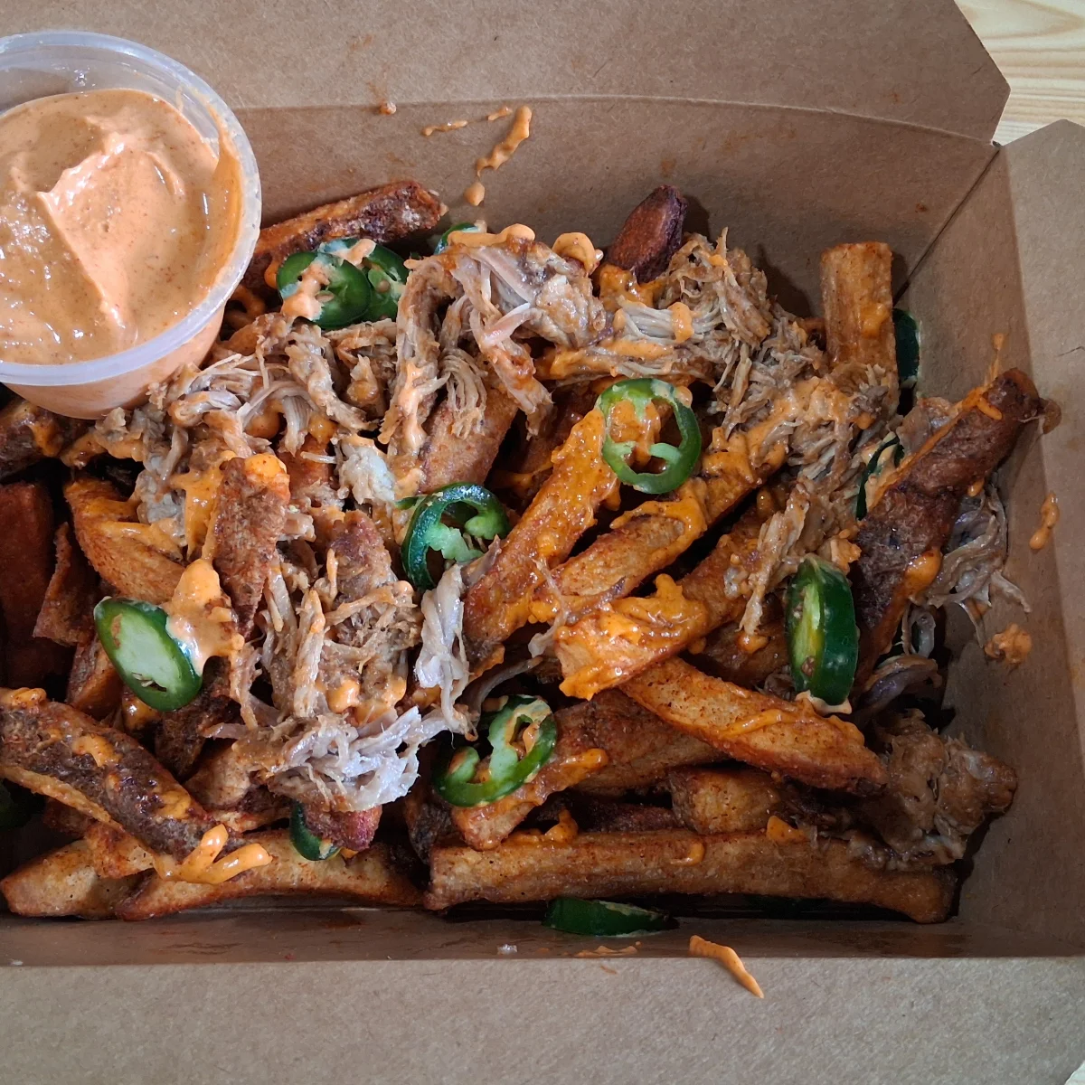 Loaded sweet potato fries with pulled pork
