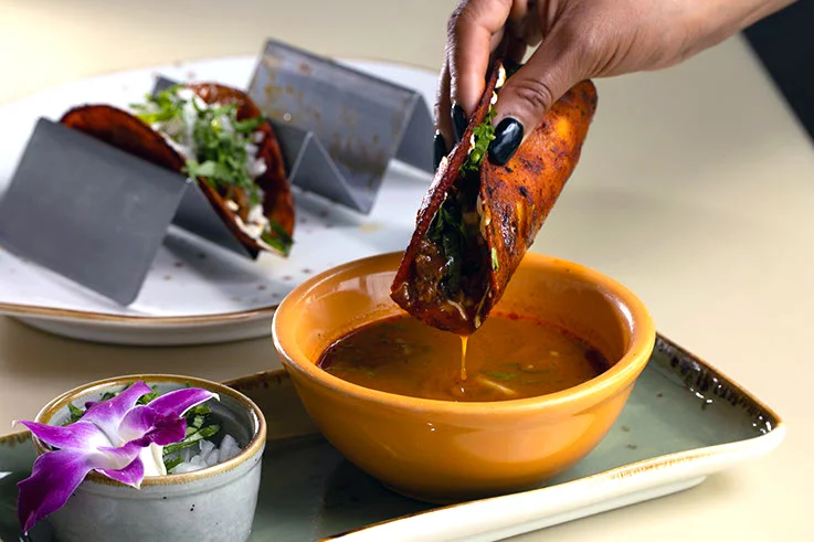 A restaurant chef preparing a dish