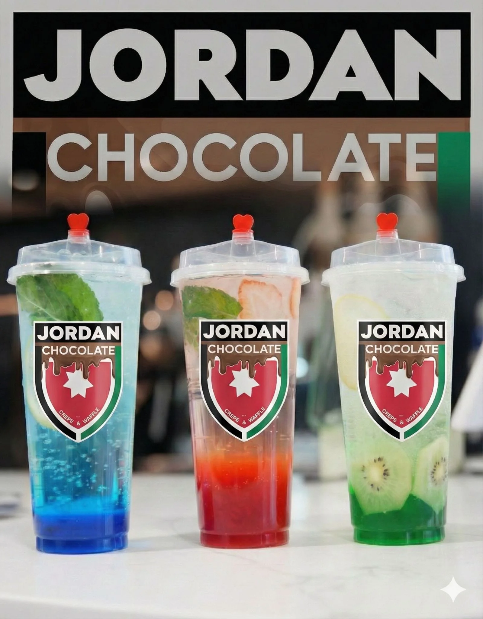 Three colorful beverages with fruit, each in a clear cup featuring a logo, served on a table.