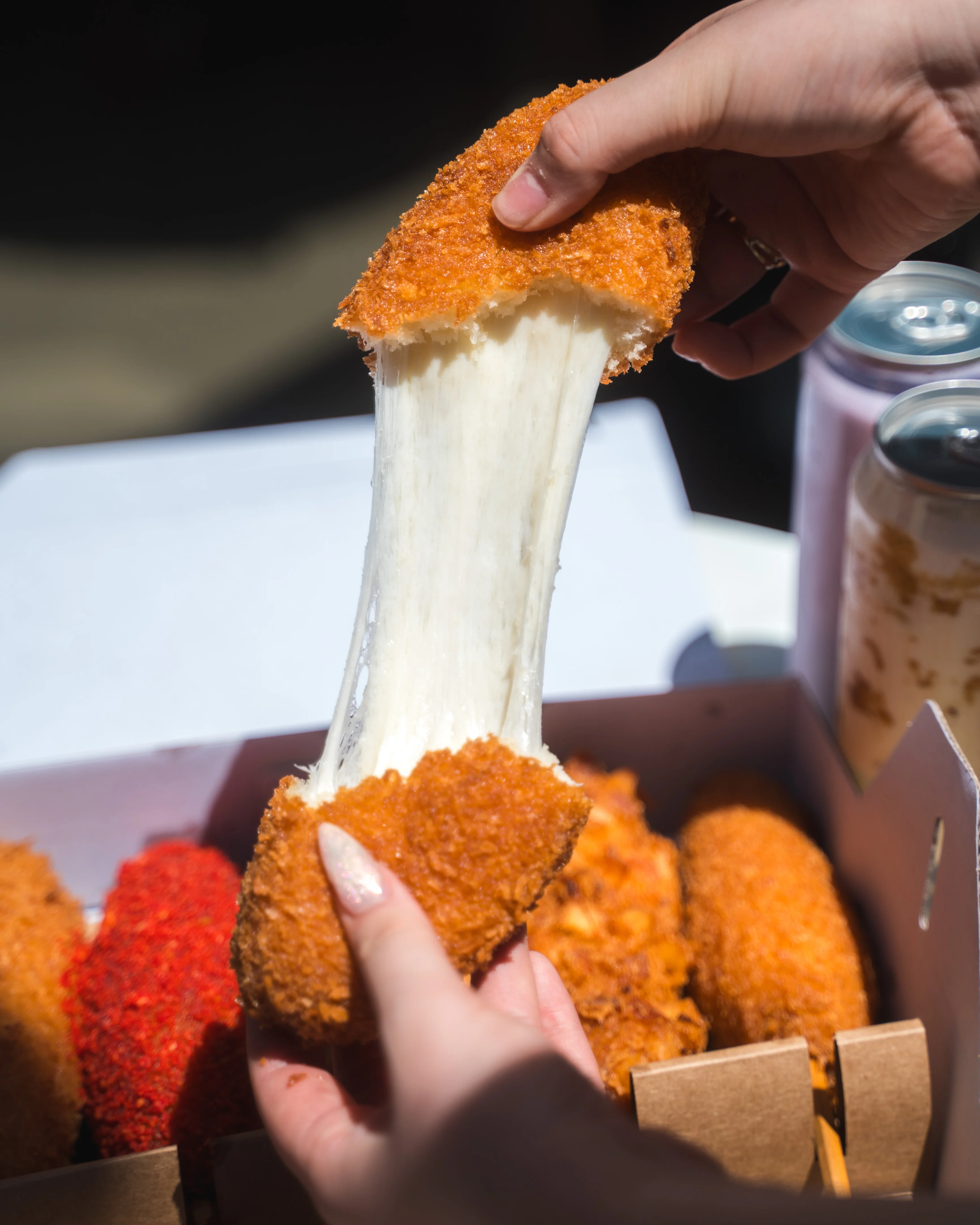 Cheesy Korean mozzarella sticks with crispy coating