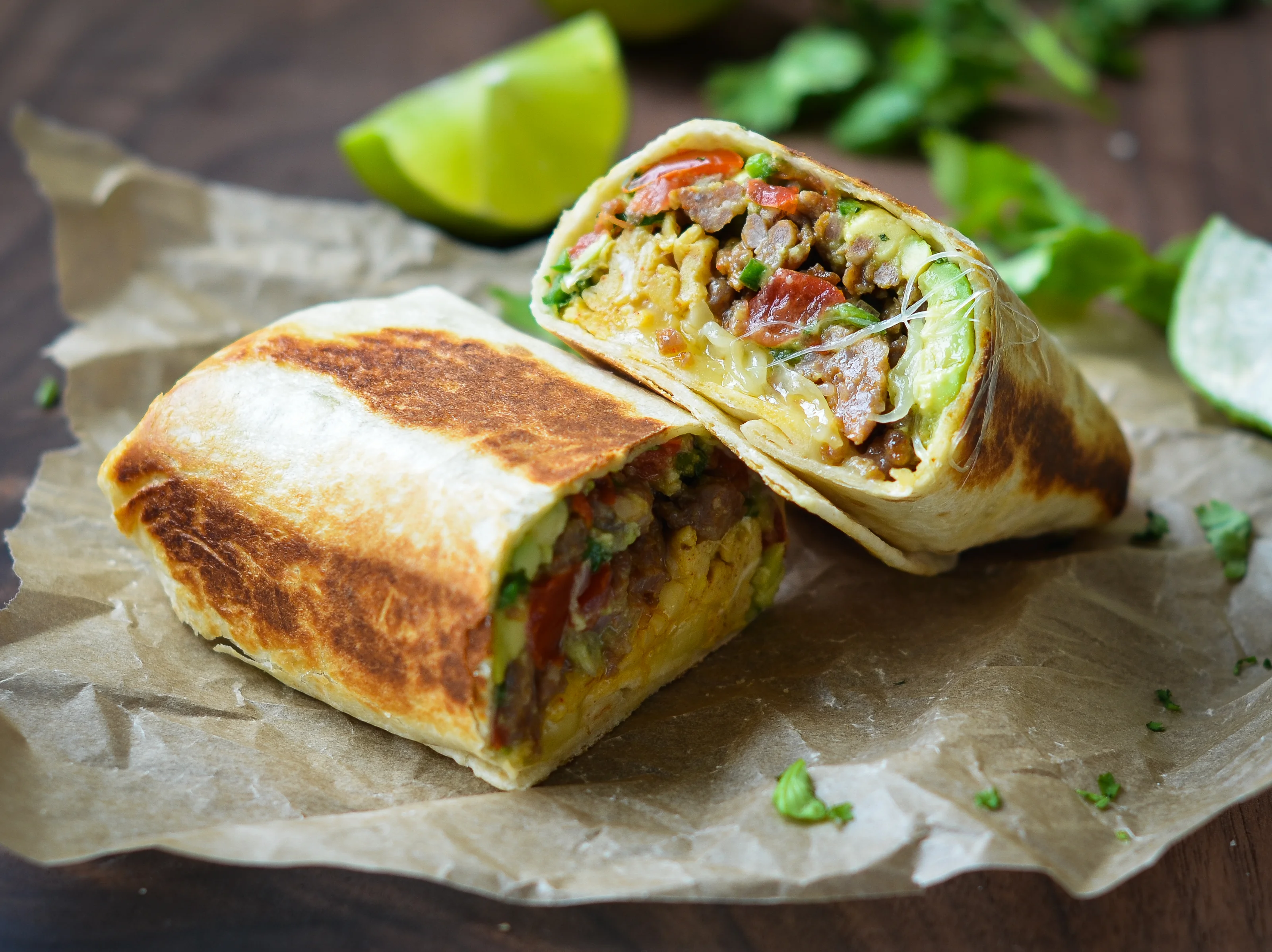 Delicious breakfast burrito with eggs and meat